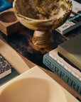 Marbled bowl on base, ochre