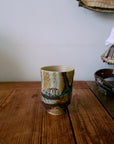 Artist ceramics: coffee mug, scratched