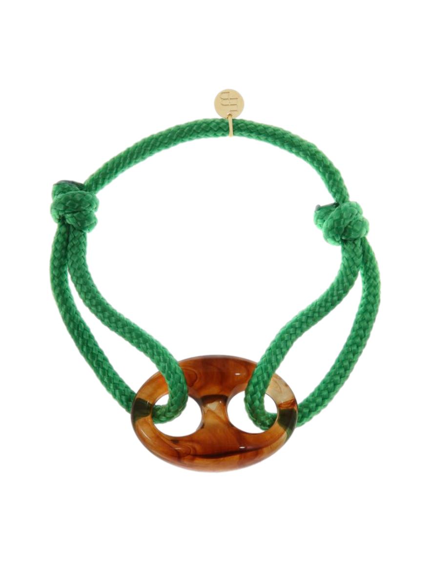 Armband met grote opengewerkte bedel / groen