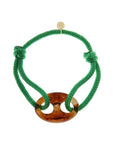 Armband met grote opengewerkte bedel / groen